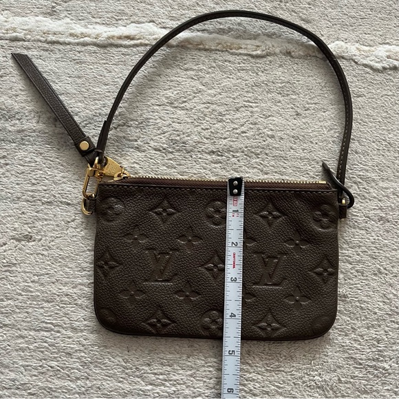 Like ๐ Louis Vuitton Empriente Citadine leather muted taupe mini pouch wristlet - Picture 17 of 17